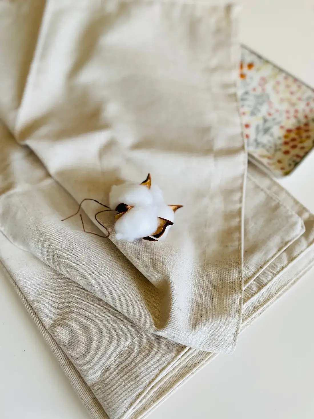Natural cotton and linen textiles with a soft cotton boll
