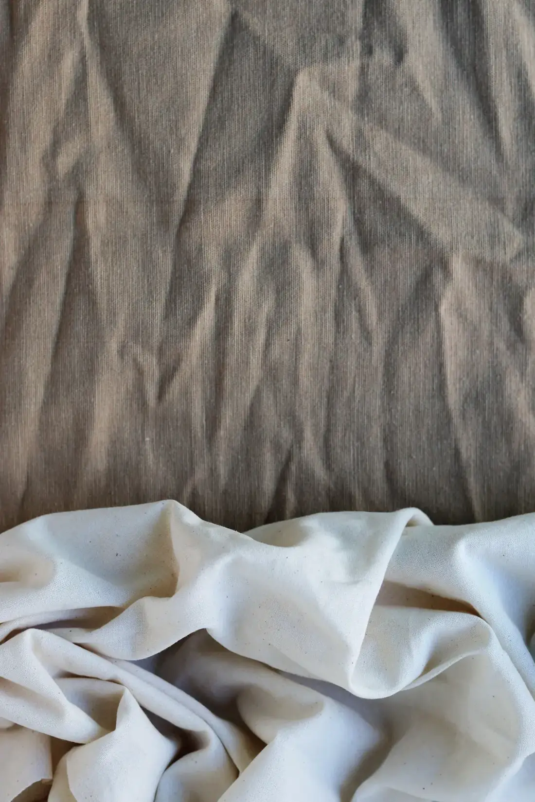Neutral fabric textures showing different textile surfaces and folds